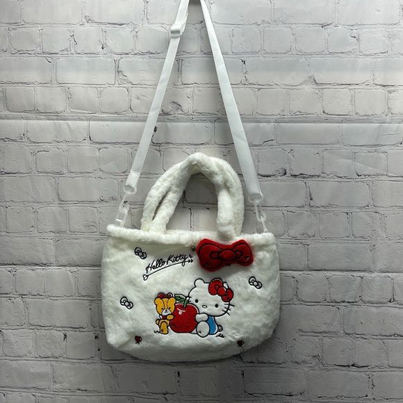 Hello Kitty Handbags - Sanrio Hello Kitty Plush Handbag 
Adjustable strap